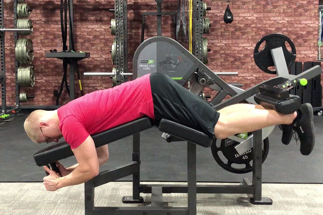 Gastrocnemius 15˚ Knee Flexion with Lying Leg Curl - Prime Plate Loaded